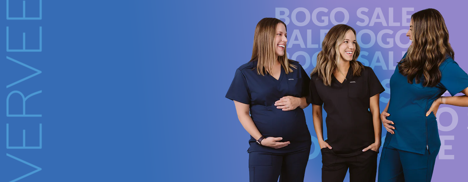 three women wearing maternity scrubs